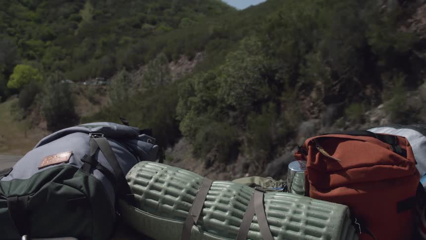 Luggage on the top rack of a car