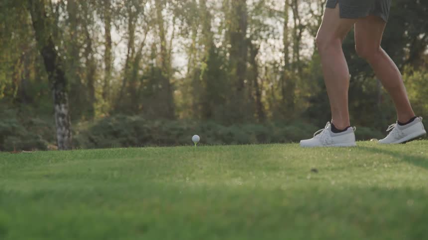 Person making a golf shot