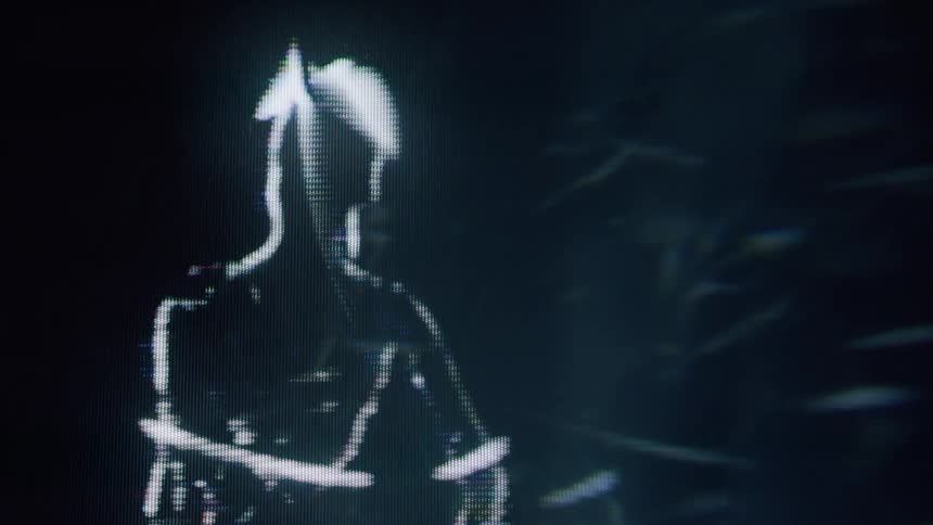A glowing futuristic figure outlined in white light against a dark background resembling a holographic or digital representation of a person