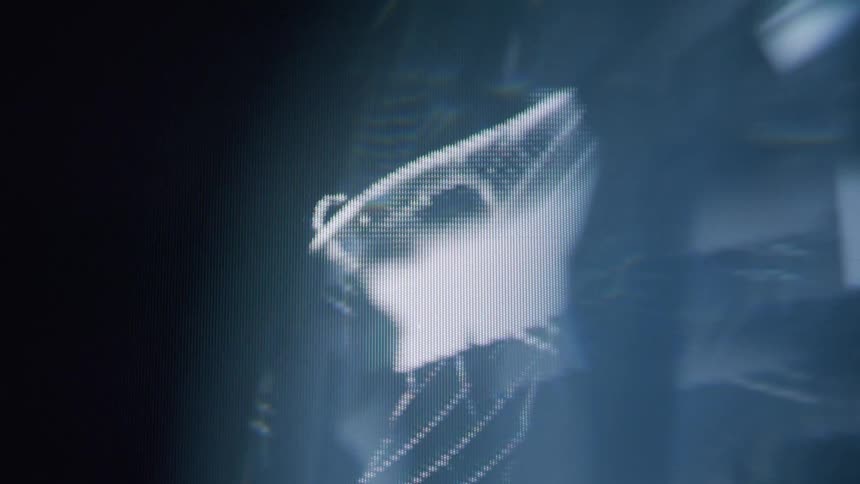 The hologram shows a woman dancing in the dark
