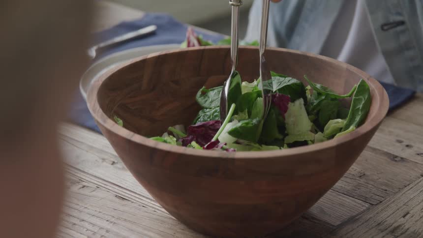 Cutlery taking some salad