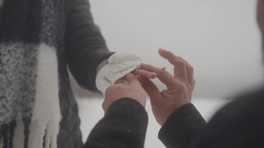 Man puts ring on his girlfriend