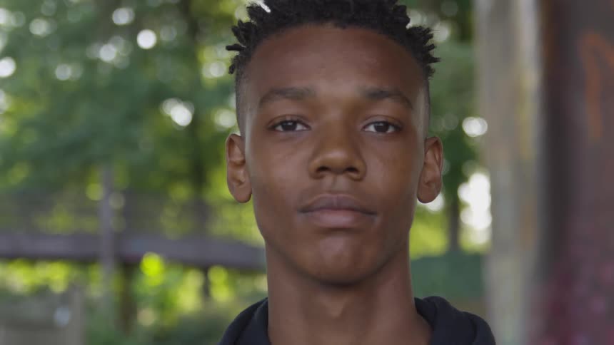 A footage of a black young boy