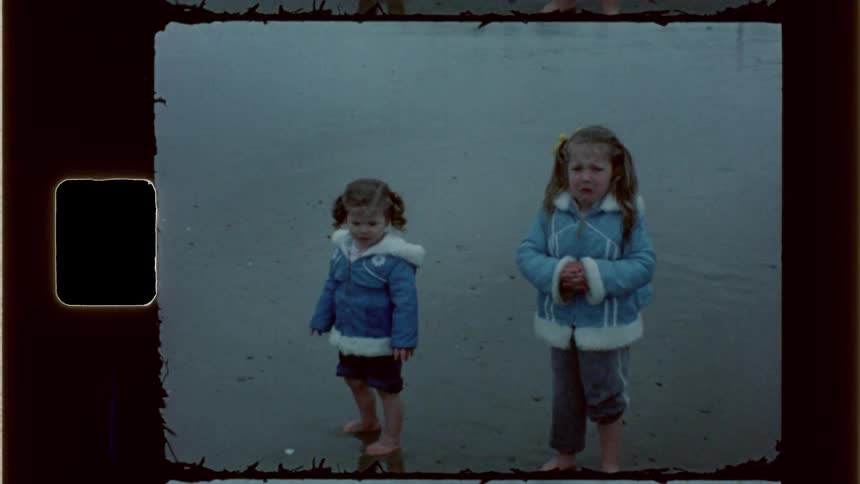 A child begins crying on the beach