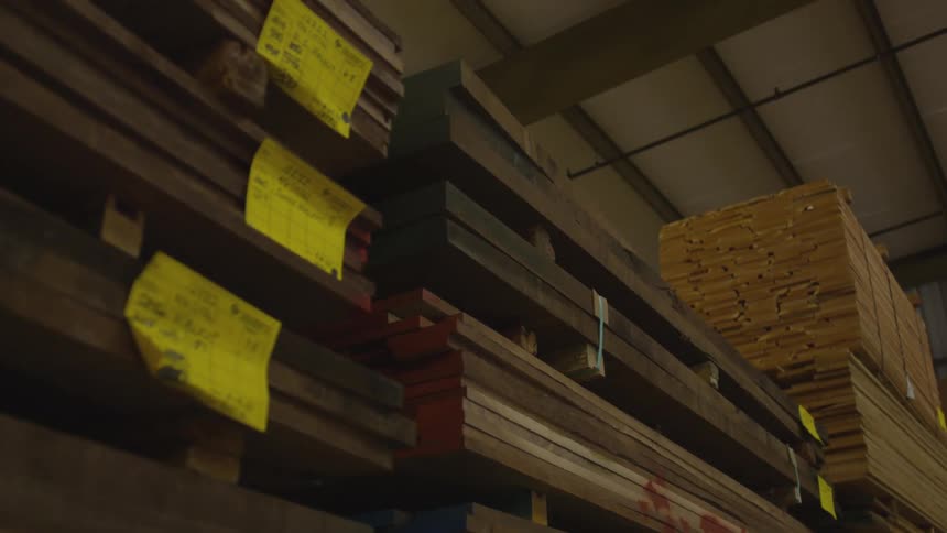 Stacks of lumber are in the store