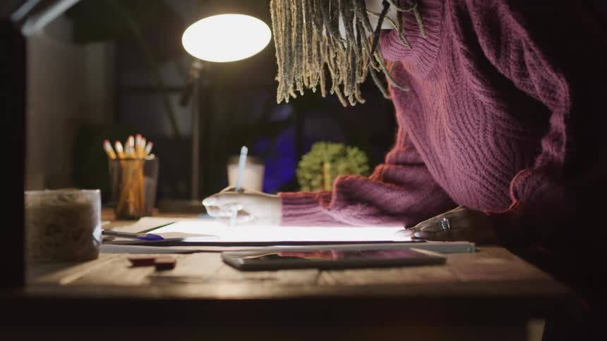 Girl drawing on a large tablet