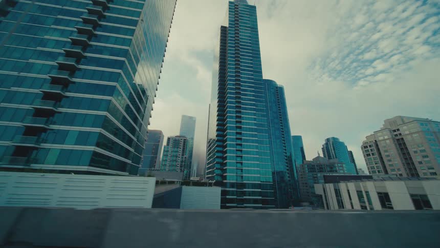 Heavy clouds are over the tall buildings