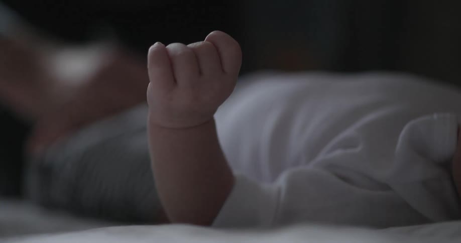A baby being dressed