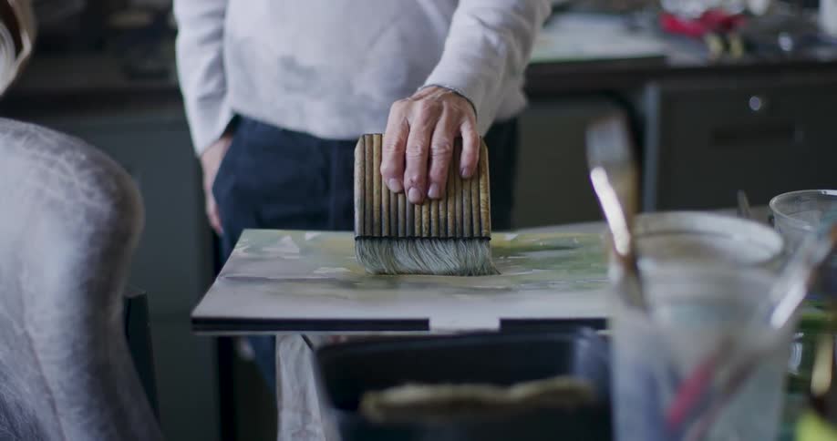 A footage of a person painting