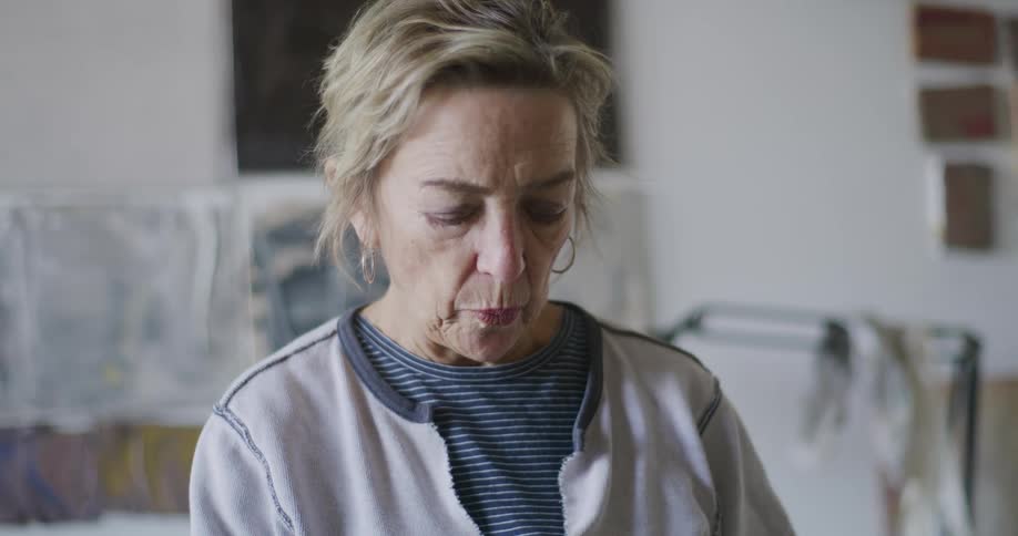 A woman is pouring something inside