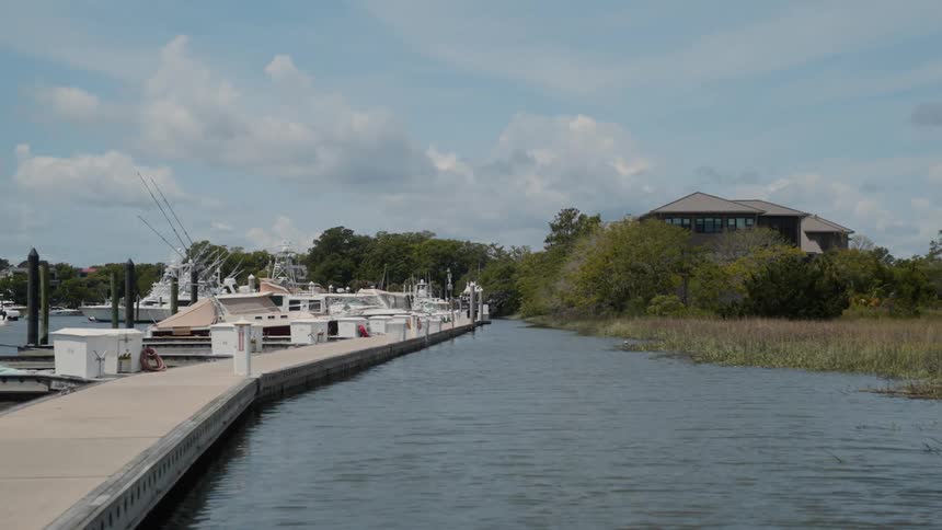 Boats are docked on the pier