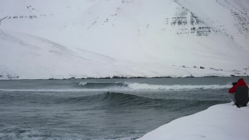 Arctic sea with people watching