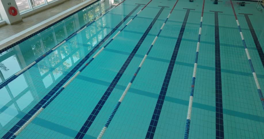 Empty lap swimming pool at an indoor gym