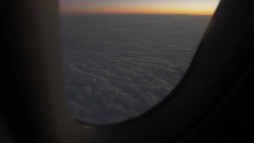 A footage of the sky from a plane window view