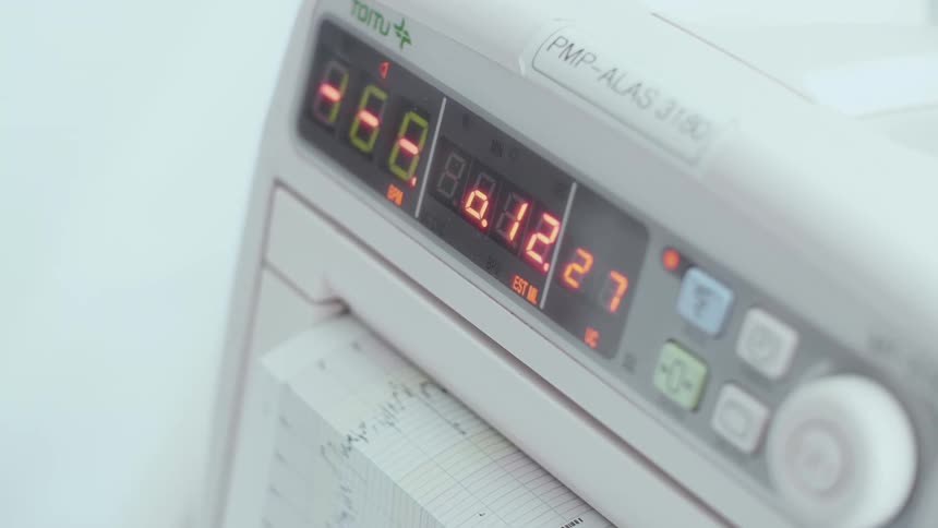 Paper is printing from the machine in the hospital