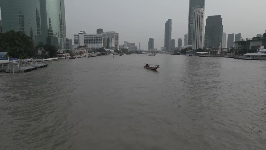 A aerial footage of a shore side in a city