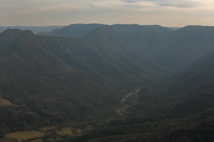 Fog sits over the mountain range