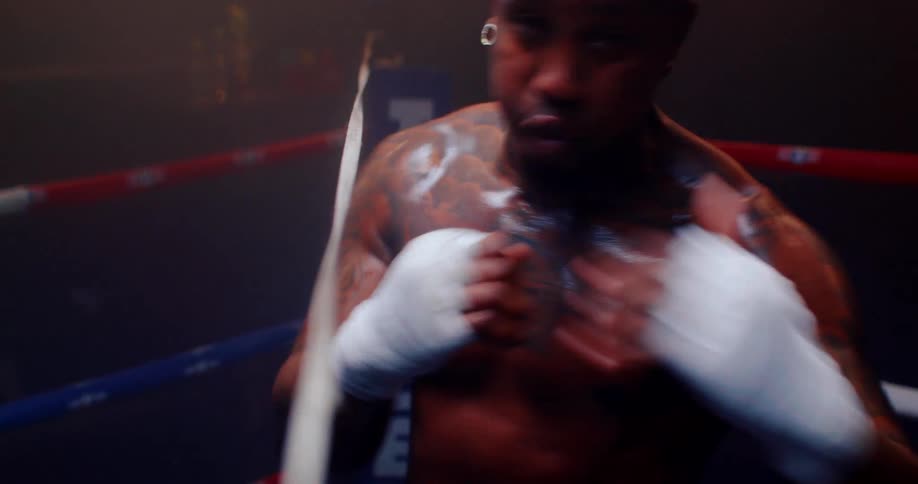 A training footage of a black male boxer
