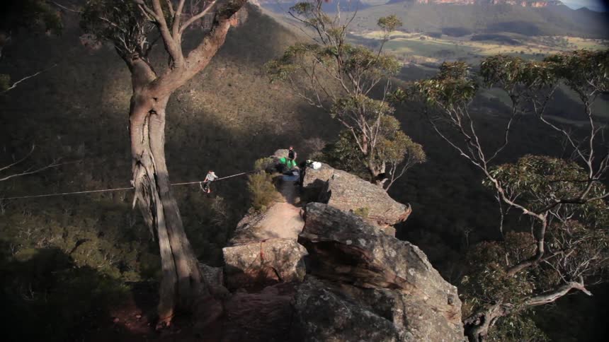 A person tightrope walking