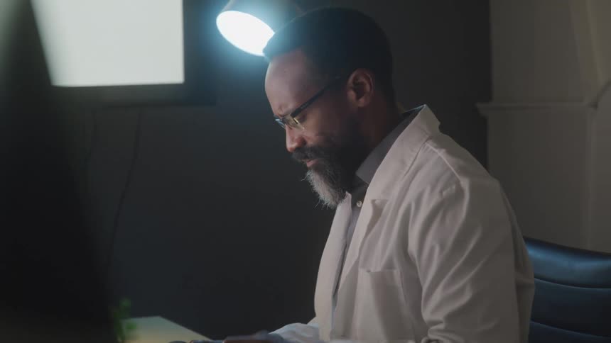 A man is thinking about something in the office
