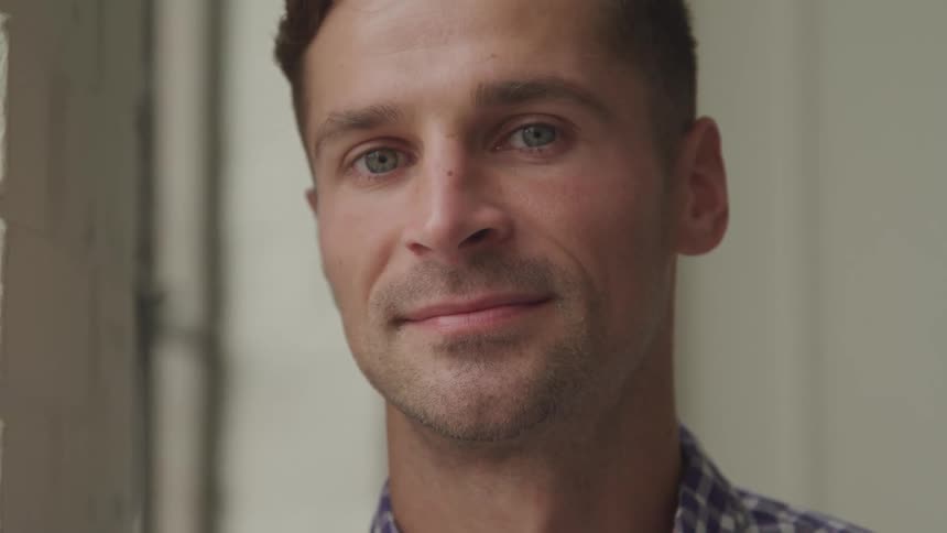A footage of a man smiling