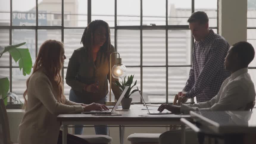 A footage of people having a meeting in the office