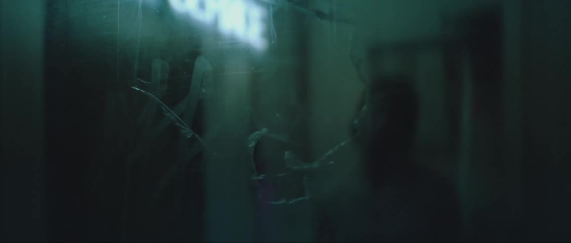 A person is reflected in the mirror
