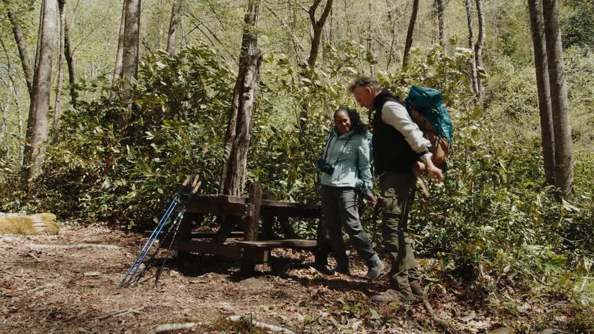 A footage of hikers in the forest