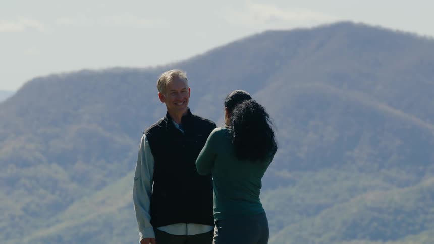 A footage of a male and female standing