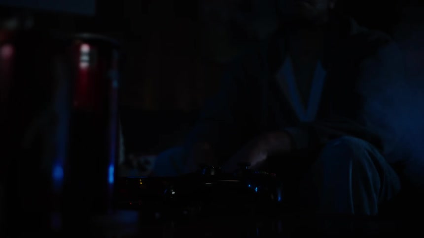 Smoke flows through the air after the dark area a man is sitting in shakes
