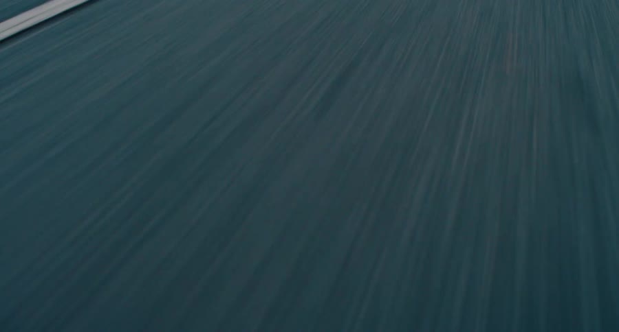 The road is moving by fast