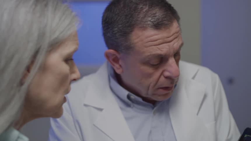 Doctors are examining an x ray of a foot