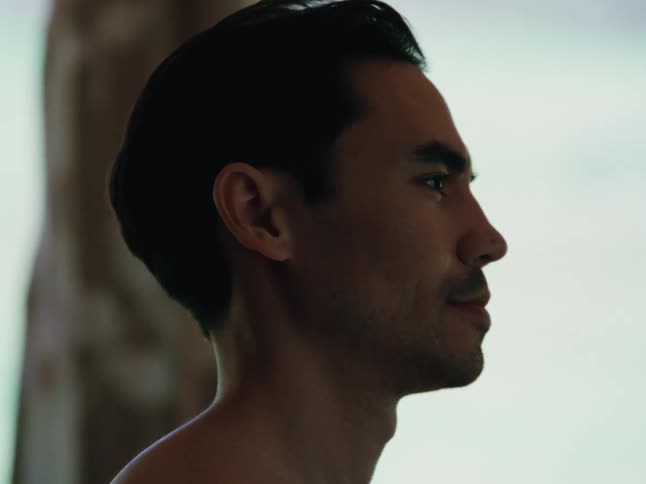 A close up clip of a man smiling