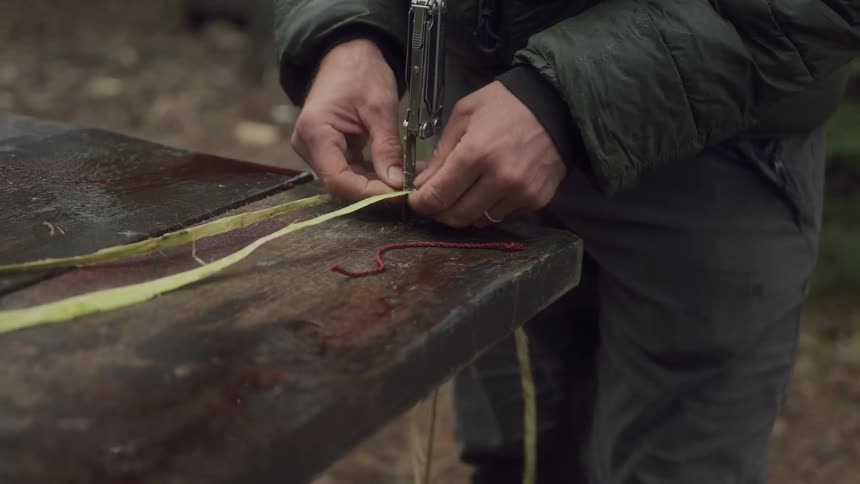 A footage of a person working on a table