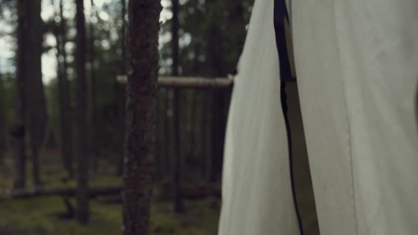 Man entering a tent
