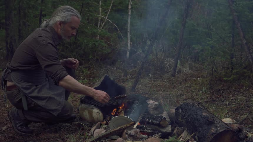 A footage of a person roasting a meat