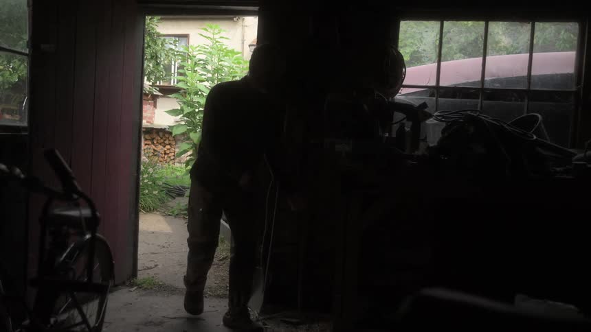 Man entering a garage