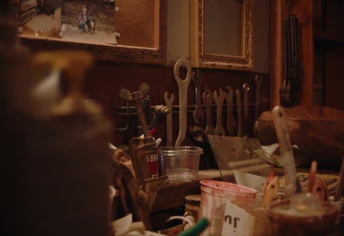 A craft room with art supplies and tools