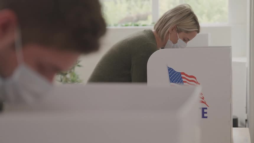 Two people are voting