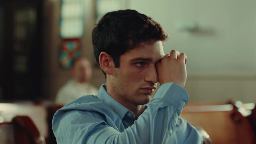 Man attending church tries to stay awake