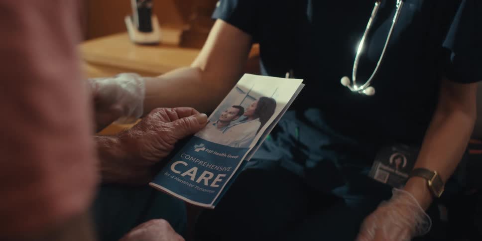 A footage of a medical professional conversing with a patient
