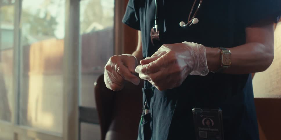 A footage of a doctor giving a home care to another person