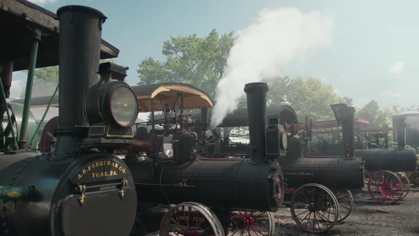 Several steam trains in a row