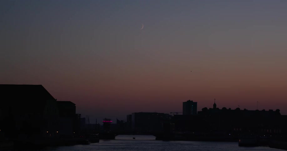 A city skyline at sunset