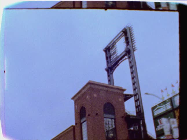 A film of building tops and the sky