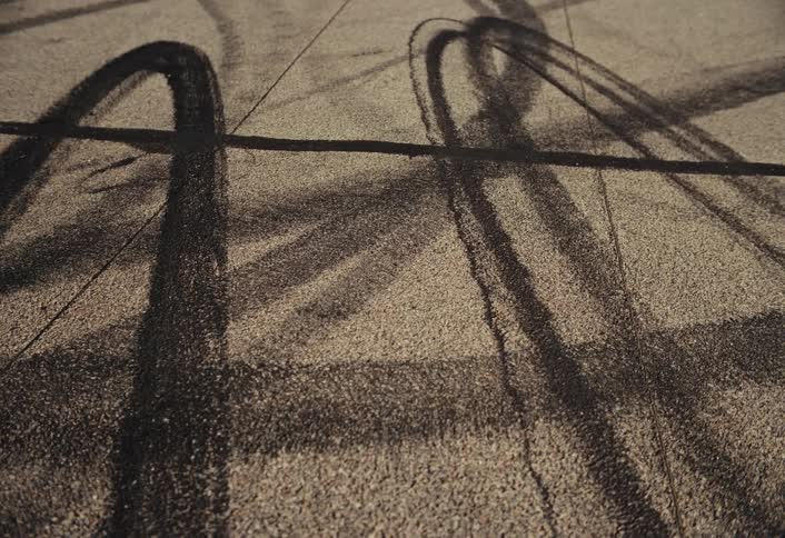 Tire burns are on the road
