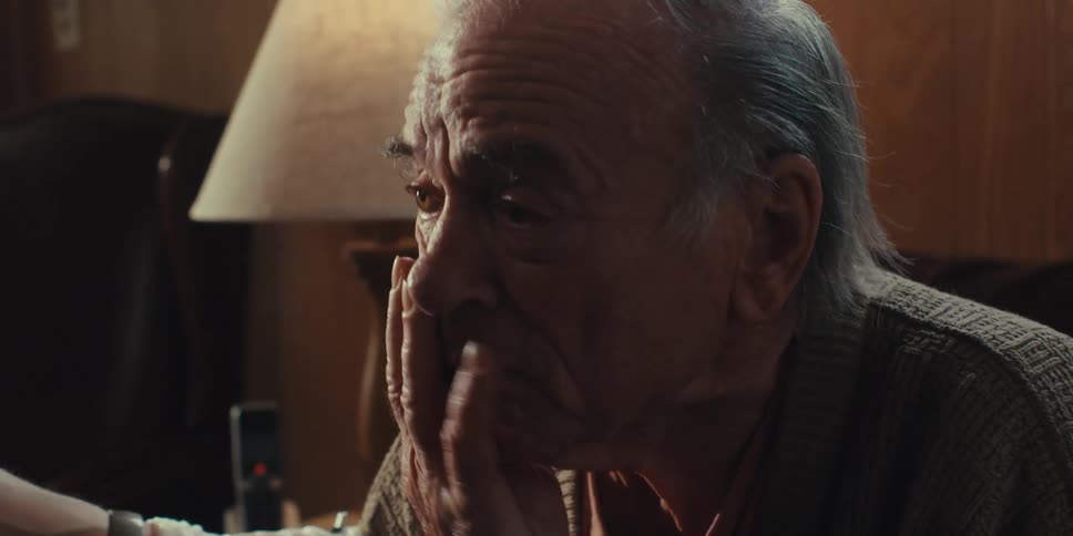 A footage of an elderly man crying