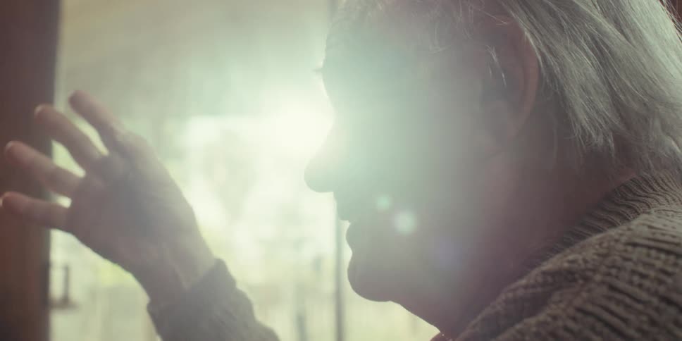 A man is talking with a nurse
