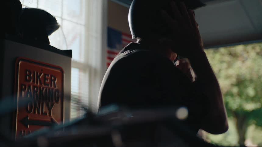 A footage of a man wearing an helmet