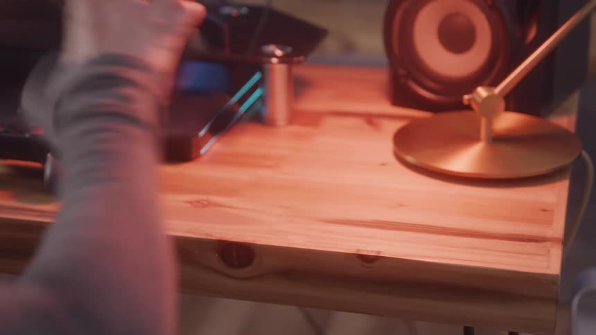 A desk is set up with electronic equipment for someone to play online games